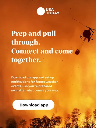 Photographic wildfire card: a helicopter over a burning ridge